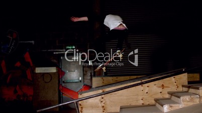 Skater doing dipped ollie down steps