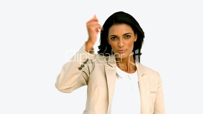 Businesswoman snapping her fingers and holding hand out