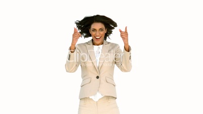 Businesswoman jumping in front of the camera