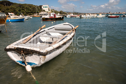 Beautiful small boat anchored in the port