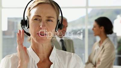 Businesswoman talking on headset