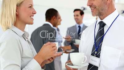 Business people chatting during coffee break