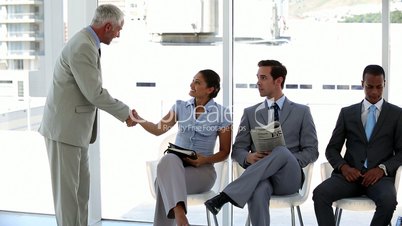 Businessman welcoming interviewee