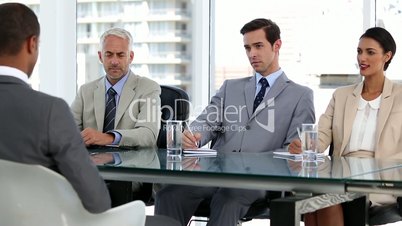 Business people interviewing a candidate