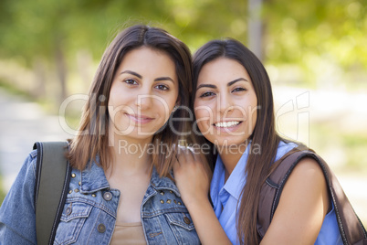 Young Adult Mixed Race Twin Sisters Portrait Outside