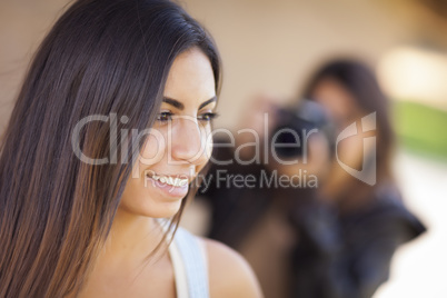 Young Adult Mixed Race Female Model Poses for Photographer