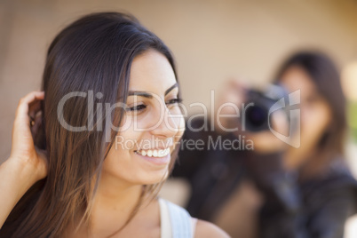 Young Adult Mixed Race Female Model Poses for Photographer