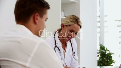 Female doctor talking to a patient 