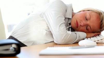 Businesswoman taking a nap