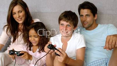 Family playing at video game