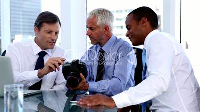 Businessmen looking at camera 
