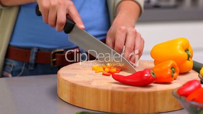 Woman preparing peppers