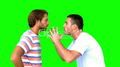 Man about to fight another man on green screen