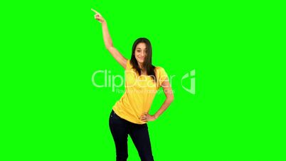 Woman doing a disco dance on green screen