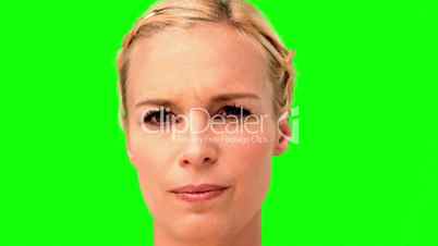 Woman showing her anger on green screen