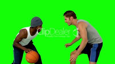 Men playing at basketball