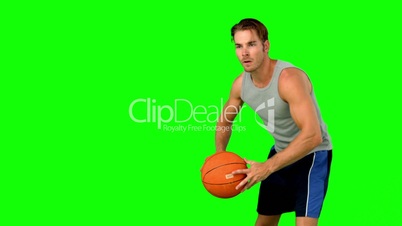 Basketball player passing the ball