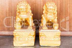 Chinese style figurine couple golden singha