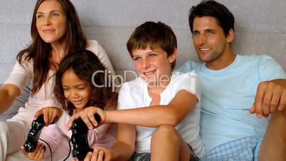 Family playing at video game