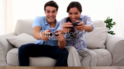 Couple playing at video game