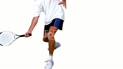 Man practicing tennis