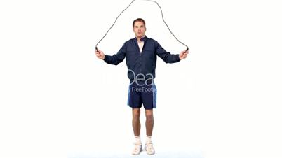 Young man training with a skipping rope