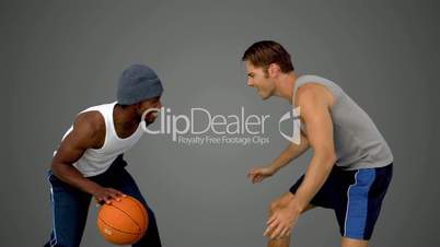 Men playing at basketball