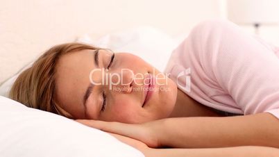Blonde woman enjoying her sleep