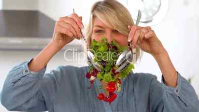 Woman preparing healthy salad