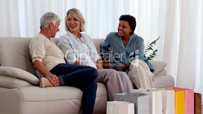 Mature friends chatting on the couch