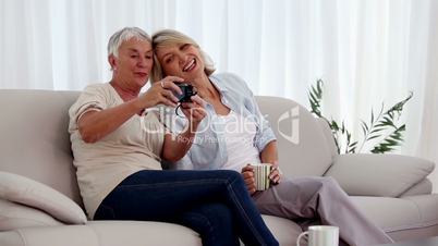 Mature women taking a picture together