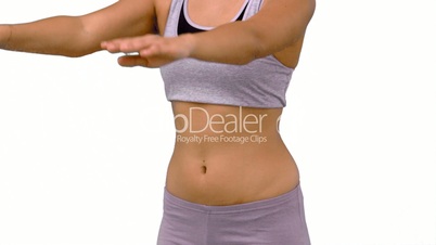 Fit woman raising her arms