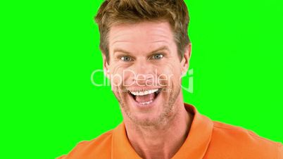 Man being surprised on green screen