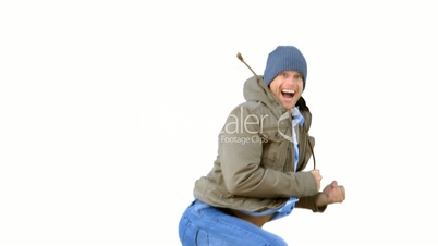 Man jumping and turning on white background