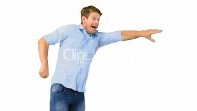 Smiling man jumping on white background