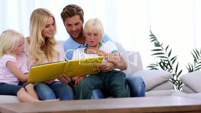 Family reading storybook together