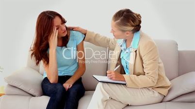 Woman getting upset talking to a therapist