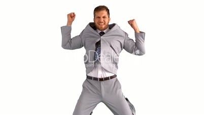 Excited businessman jumping and cheering on white background
