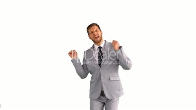 Businessman dancing and smiling on white background