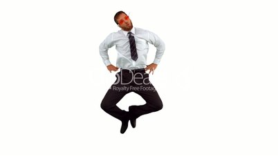 Businessman jumping up wearing swimming goggles