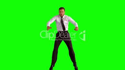 Businessman jumping up and doing the splits