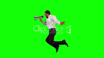 Businessman holding megaphone jumping up