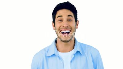 Man laughing at the camera on white background
