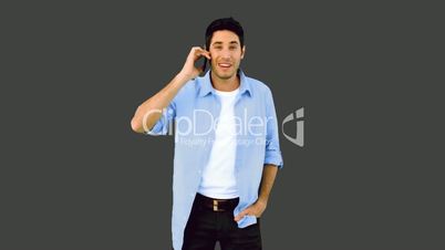 Man talking on phone and laughing