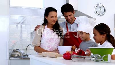 Family preparing pastry together