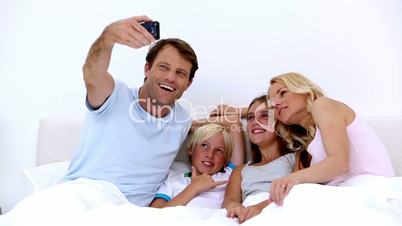 Dad taking a self portrait of him and family