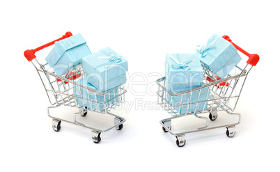 Cyan gift boxes in shopping carts