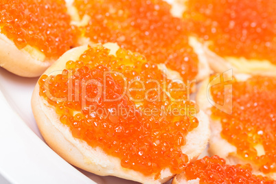 Sandwiches with red salted caviar