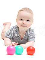 Happy baby with balls