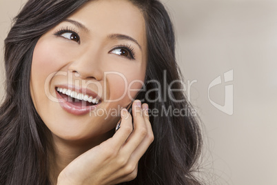 Beautiful Asian Chinese Woman Talking on Cell Phone